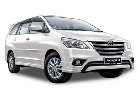 White Toyota Innova for outstation trips